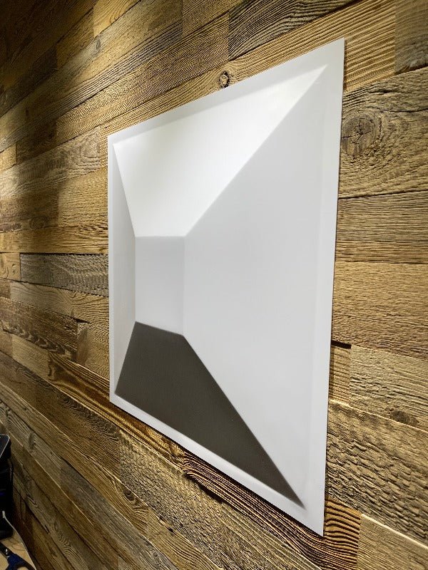 3D PVC Inca wall panel installed on a room's wall, showcasing its texture and design