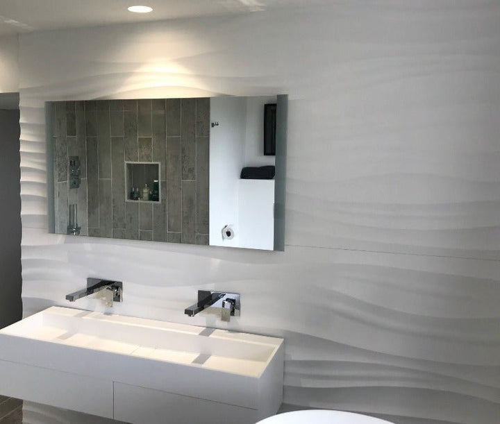 A modern bathroom featuring the Canyon 3D MDF Wall Panel as an accent wall behind the vanity