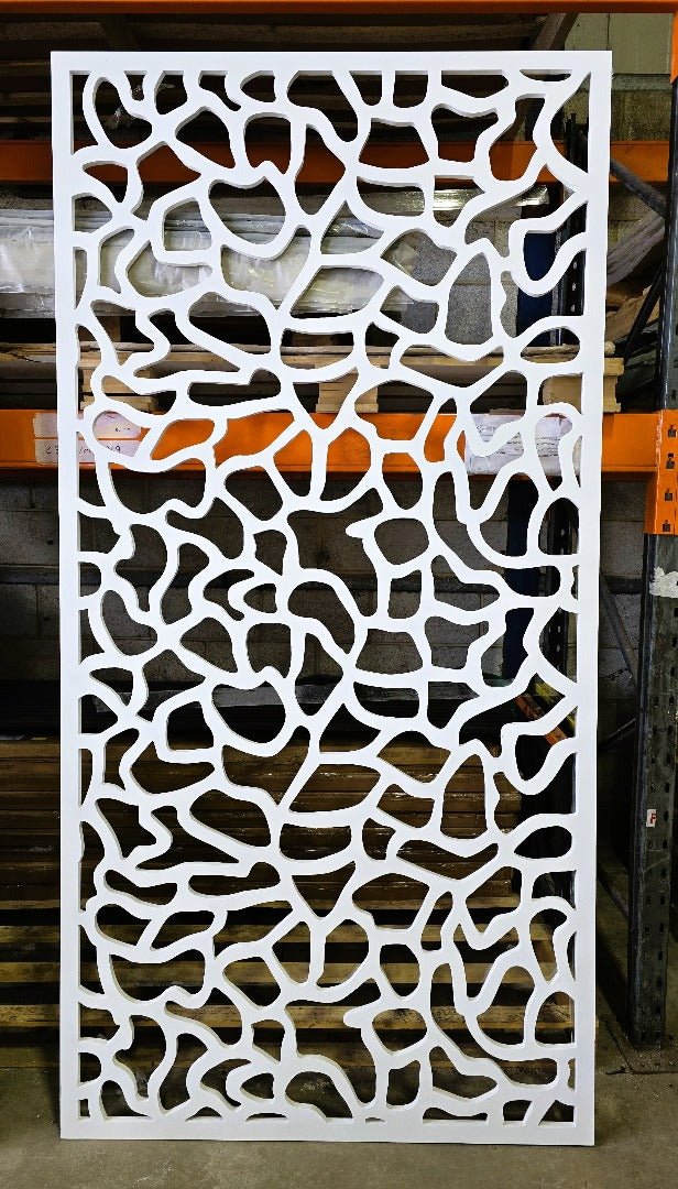 Intricately carved MDF fretwork panel in white on display in portrait position