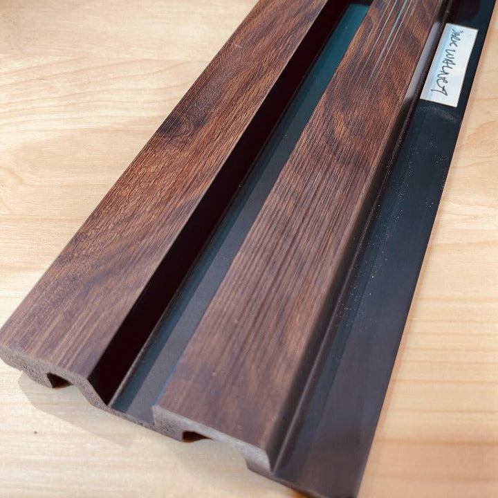 Detail shot of the interlocking mechanism of Dark Walnut Slat Wall Eco Panels