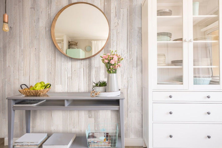 Marsk Whitewashed Wood Panels complementing a chic white cabinet and mirror