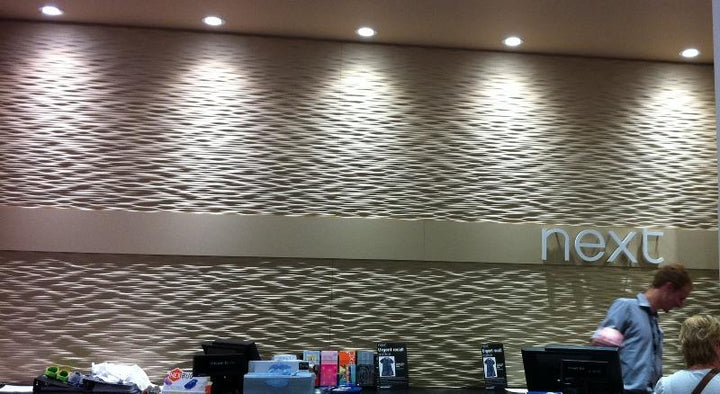 Detailed view of the Ocean 3D MDF wall panel with a distinct wavy texture
