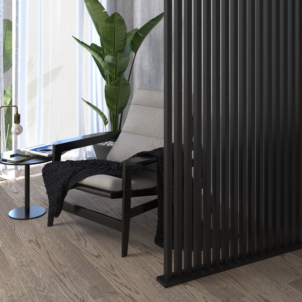 Black room slat dividers with chair and plant.