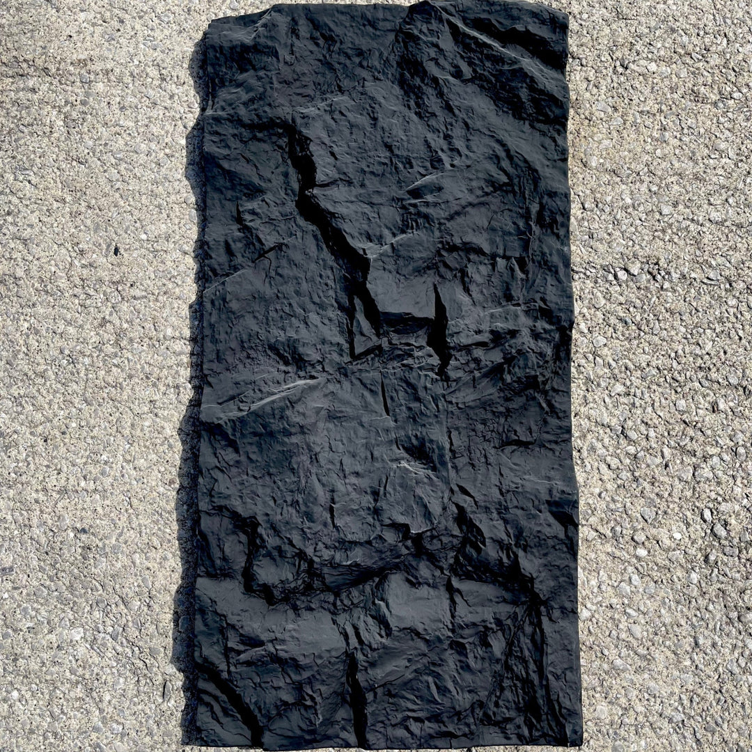 Jet Black Natural Rock PU wall panel showing full panel size 1200x600mm